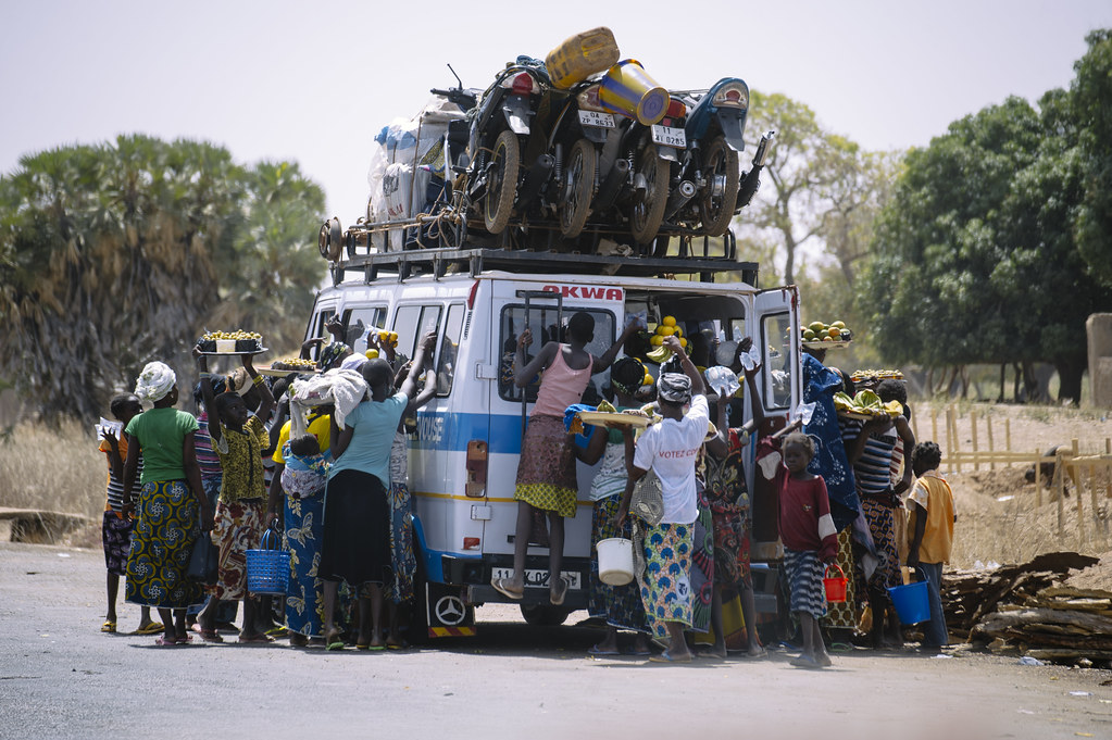 On the road between Ouagadougou and Manga, a van sells fruits and vegetables on the roadside. Burkina Faso, Africa.