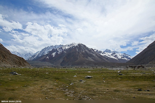 chapursan clouds elements gilgitbaltistan gojal greenery ice landscape location mountains pakistan sky snow vegetation wide