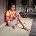 Iban girl weaving in longhouse
