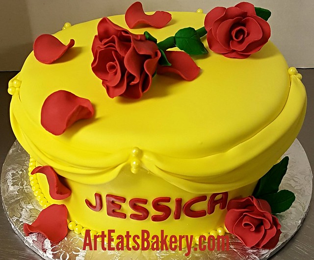 Yellow fondant Beauty and the Beast ladies custom birthday cake with edible roses and petals. Http://www.arteatsbakery.com #bakery #customcakes #cakedecorating #cake #greenvillesc #greenville #whatsgoingongvl #birthday # rose #beautyandthebeast #iongreenv