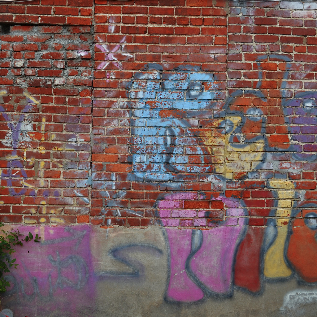 Graffiti On Brick Wall
