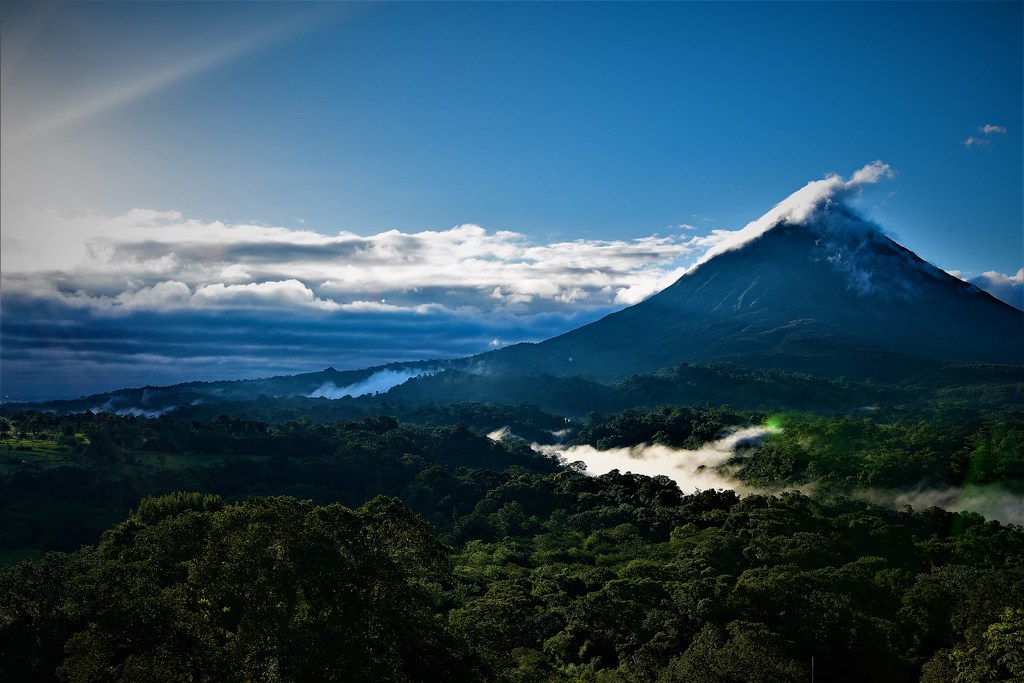 Sunrays across Arenal Volcano, Costa Rica.