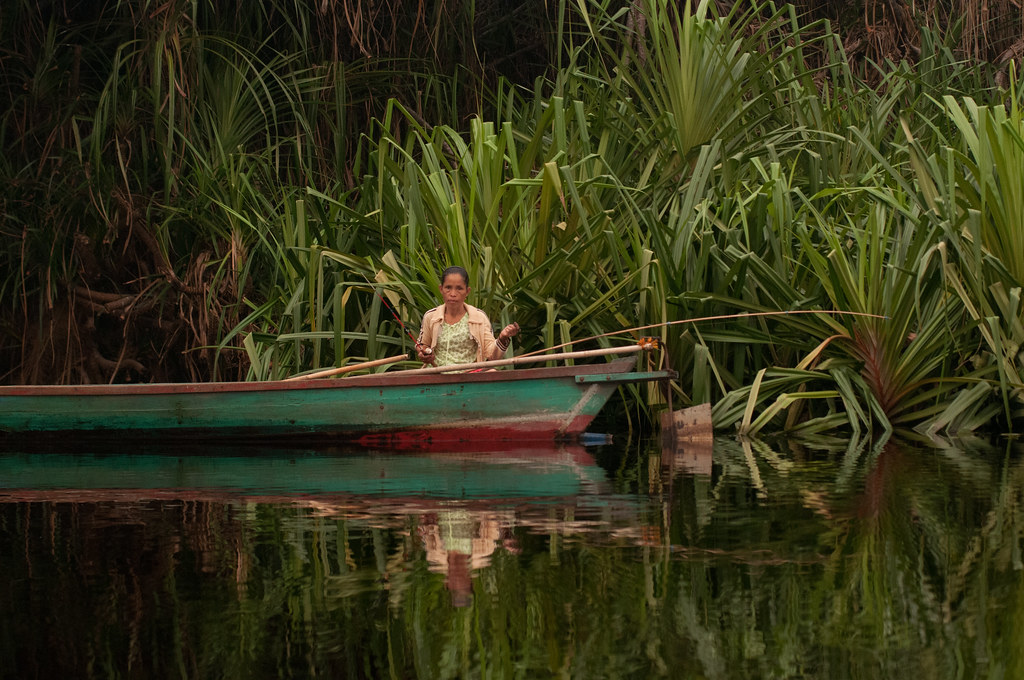 A woman fishes in Sebangau national park, Central Kalimantan.