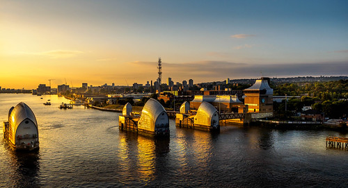 riverthames waterfront london river sunrise reflection tidal thamesbarrier seadefence barrier skyline clearskies flooddefence