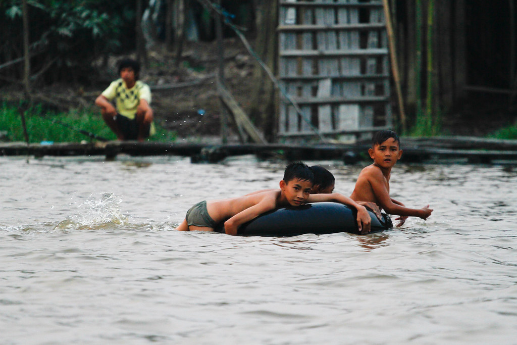 Boys playing in the water in Central Kalimantan, Indonesia.