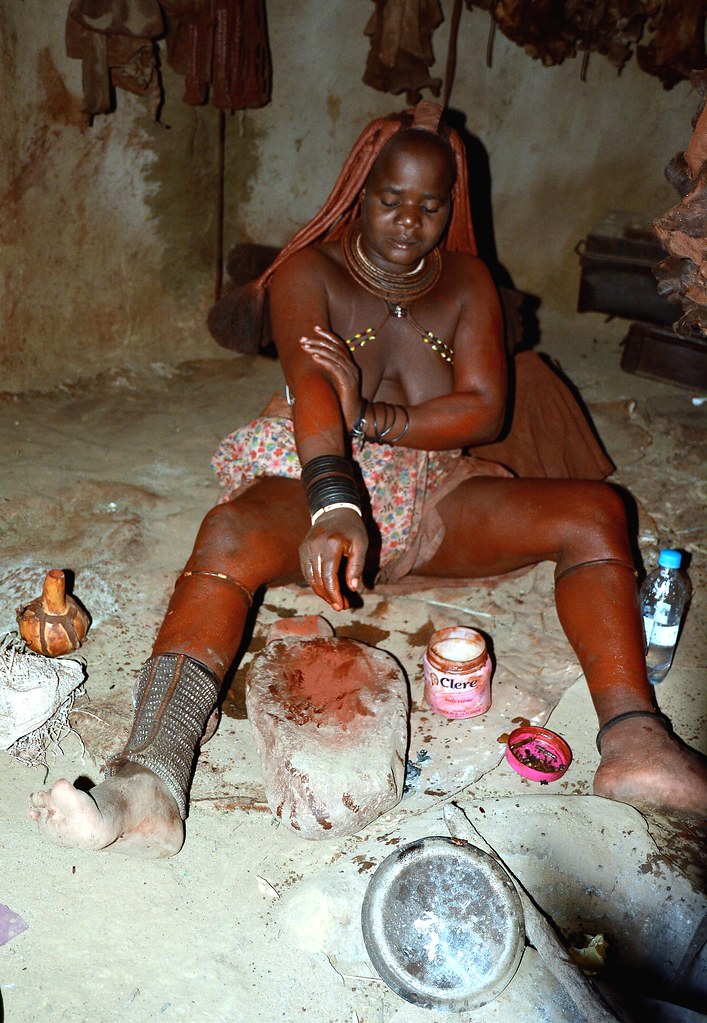 Himba girl  - a traditional make up session!