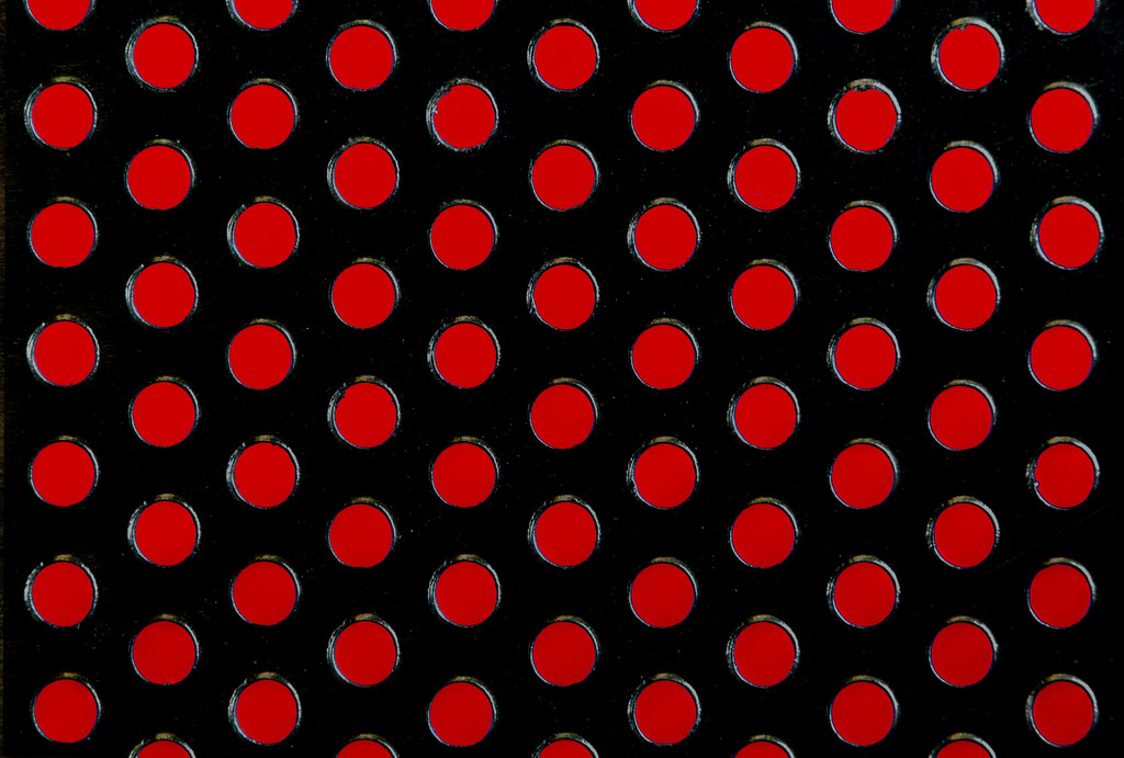 Red On Black Polka Dots Red Background Shot Through A Grea