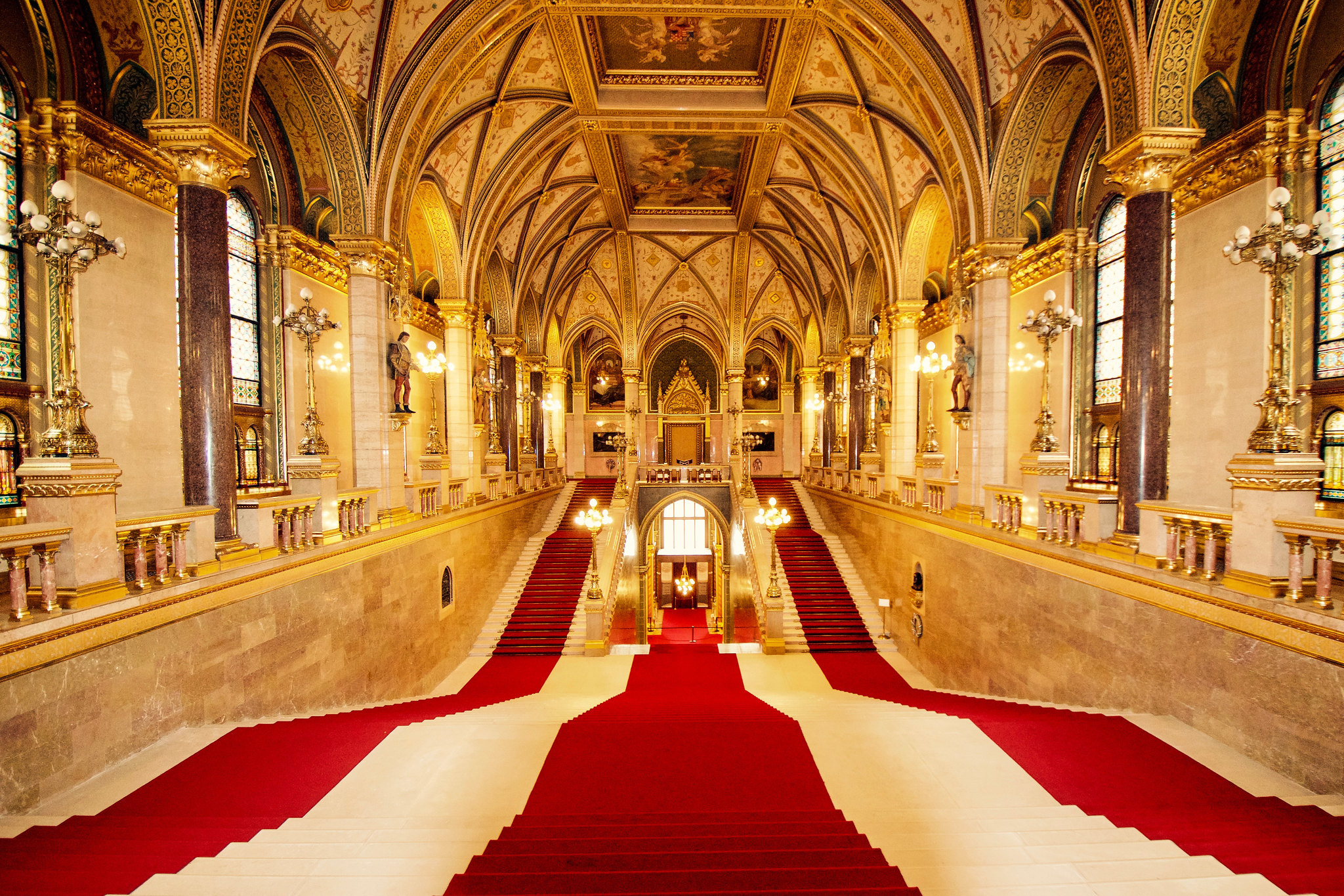 Grand, immaculate staircase inside the Hungarian Parliament Building