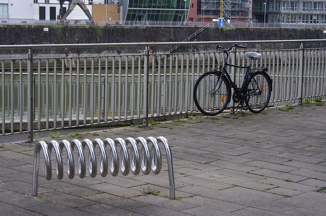 Art in public space and a useful bikerack in the back