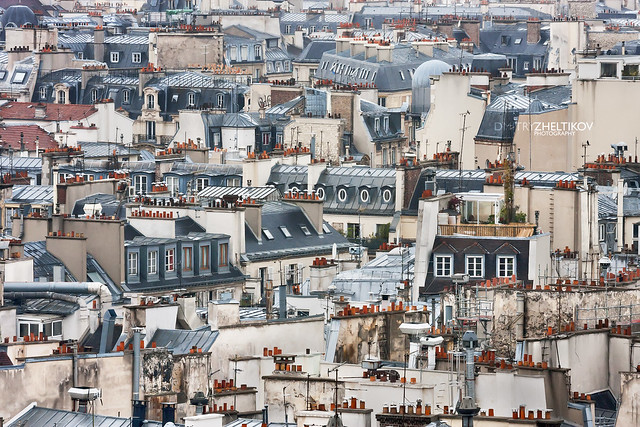 Orange chimney pots of Paris roofs