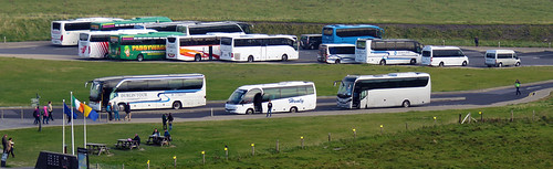 Only a few buses decorate the parking lot of the Cliffs of Moher in Ireland