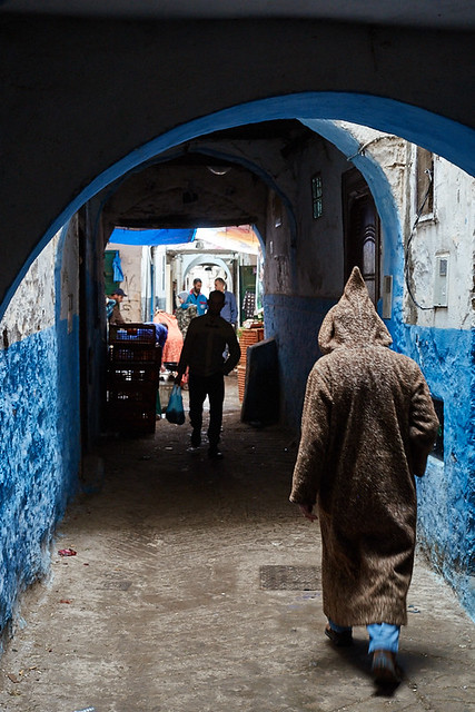 Morrocan man in djellaba walking in medina, Tétouan, Morocco
