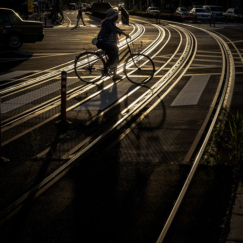 tokyo kumanomae arakawaline track twilight bicycle sunset shadow street reflection curve