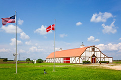 American flag and Denmark flag fly at the Danish Heritage Museum in Danevang Texas