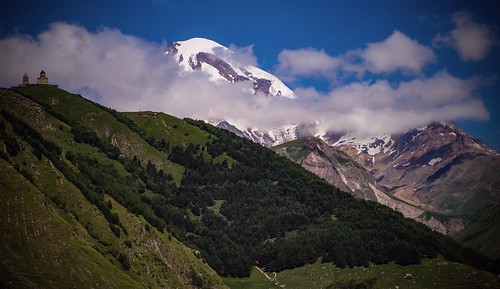 kazbeg kazbegi georgia caucasus gergeti mountains bluesky blue clouds snow sony sonynex