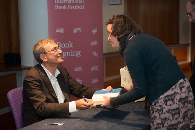 Orhan Pamuk signs copies of The Red-Haired Woman