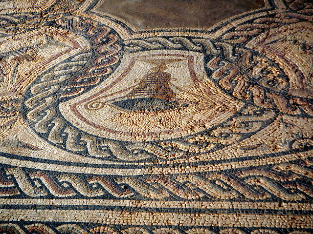 Mosaic tile floor in Clunia, a Roman ruin that had existed as a town for several hundred years (from pre-Roman times until about the 3rd century AD)