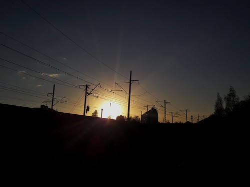 sunset suburban railways wires moscow evening light sky clear clouds