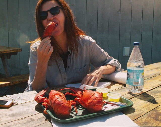 Maite with lobster at Muscongus Bay Lobster Co.; Round Pound, ME (2017)