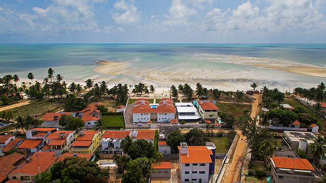 Drone view of streets and Manga Verde Beach resort, Island of Itamaraca, Pernambuco, Brazil