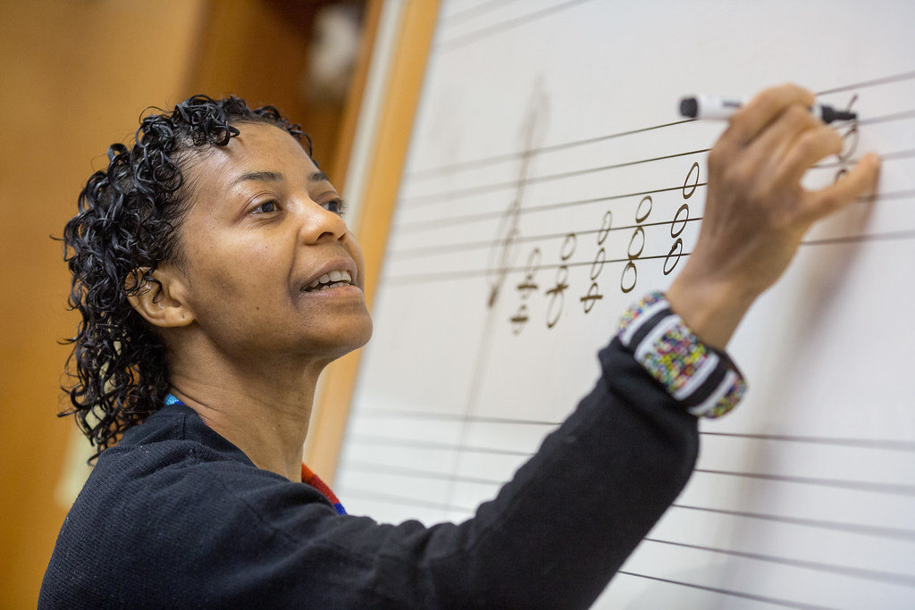 High school music teacher writing on board | A music teacher\u2026 | Flickr