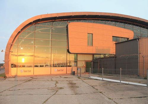 Modlin Airport with reflected sunrise by NitroGL,