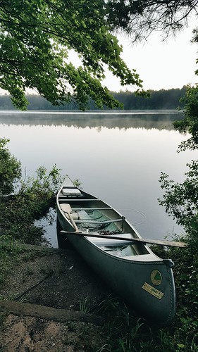 canoe lake peaceful tranquil morning camping michigan up upperpeninsula swan hiawatha national forest fog cool early recreation nature