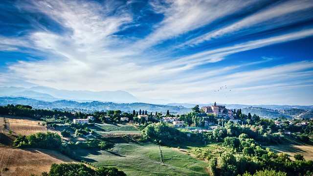 Italian scenery with a small village on a hill