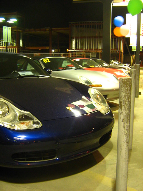 A row of used Porsches