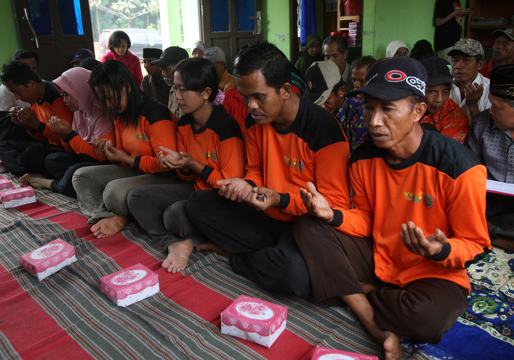 Praying during the presentation of firefighting equipment to to Garantung village, Palangkaraya, Indonesia.