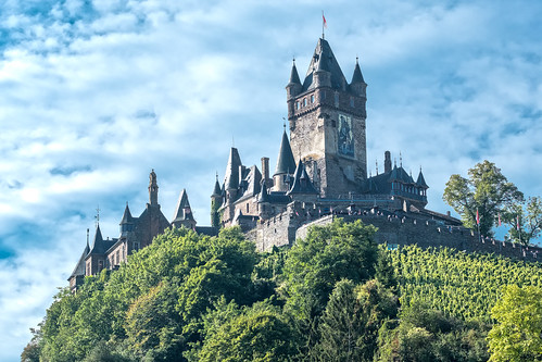 cochem germany moselle castle sky clouds green trees hill vineyard