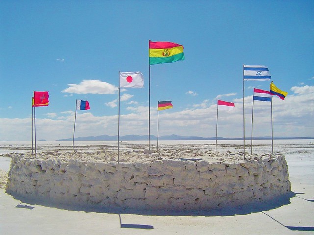 These different country #flags from all over the #world showcase the large number of people who visit the Uyuni Salt Flats. The #Uyuni #SaltFlats are one of the most incredible vistas on Earth & is truly one of the #TreasuresOfTraveling in #SouthAmerica t