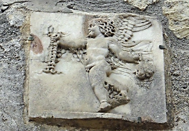 Cupid - marble bas relief - House of the Skeleton at Herculaneum (79 AD)