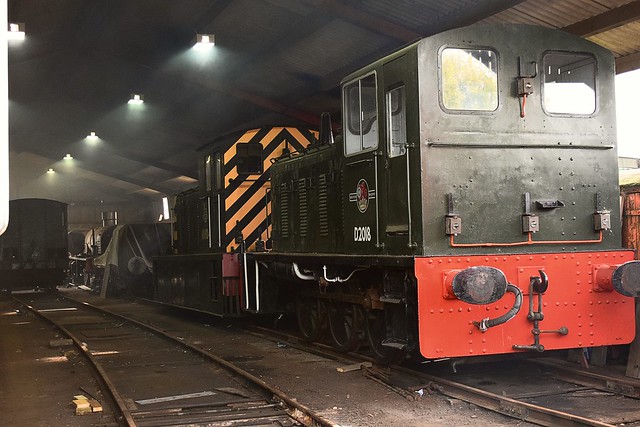 Class 03 D2018 stands at the shed entrance, with Drewery Vulcan D78, wearing the guise of 11104, a Wisbeach & Upwell Tramway Loco. Mangapps Railway Museum. 25 10 2015