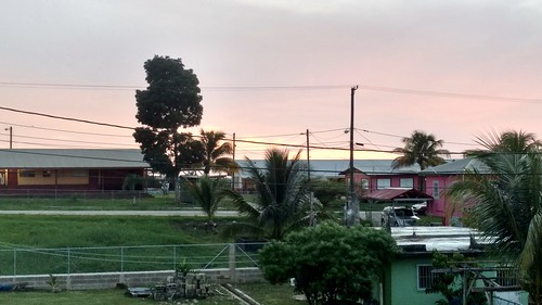 belmopan belize sunset houses sky