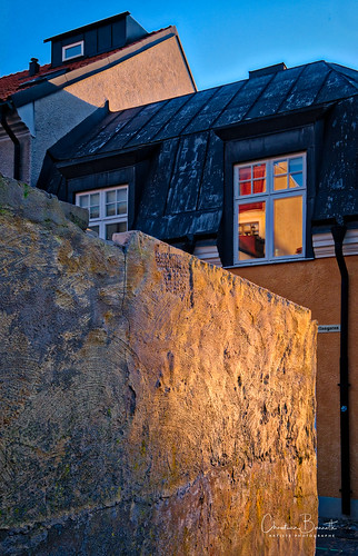 sweden gotland visby medieval wall house architecture sunset warm