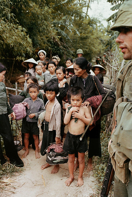 Vietnam War 1966 - American Marines Guarding Vietnamese Villagers