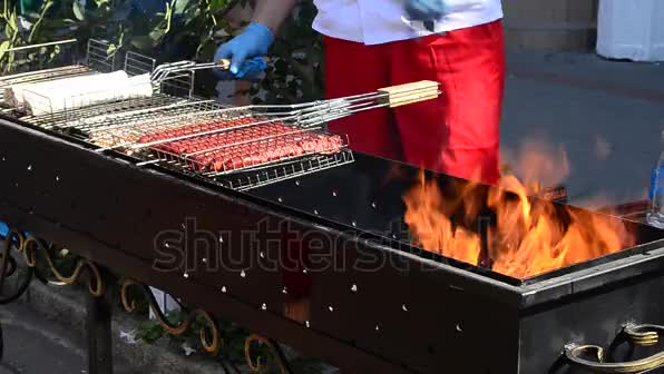 Technology of preparation of sausages on a brazier.