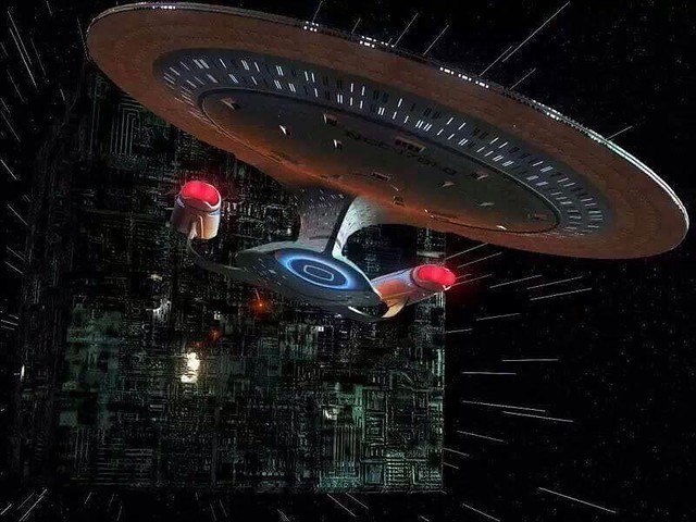 Borg Cube chasing USS Enterprise NCC-1701-D