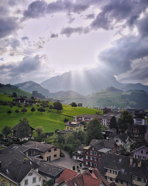 (#droneview) | #Stans Lucerne. The small and quaint town at 450 meters above sea level with roughly 8,000 inhabitants lies in privileged position between Lake #Lucerne and the mountains. The main town of #Nidwalden, at approximately 20 minutes from Lucern