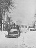 A tow truck tries to navigate snow-clogged streets. (Rocky Mountain News / Denver Public Library Archives)