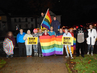 LGBT Walking Unit before step off for parade, including members of Crawford Area LGBT+, Unitarian Universalist CHurch of Meadville, Showing Up for Racial Justrice Crawford County, Allegheny College grouos Why Not Us? and Gender Sexuality Alliance
