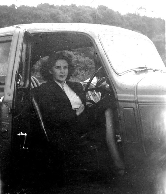 Sexy woman sitting in a car
