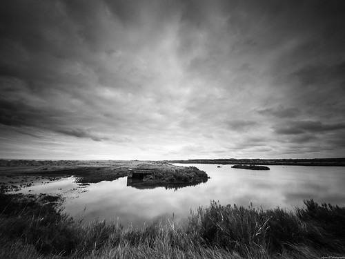 norfolk coast coastal titchwell rspb eastanglia eastangliancoast sky cloud cloudy bleak dark water lagoon reeds pillbox concrete old derelict decay decaying reed gopro goprohero6 matchpointwinner mpt613