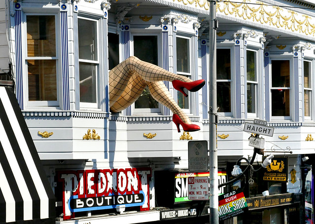 San Francisco.  Legs Hanging Out The Window.