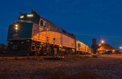Evening Via by Joseph Bishop, Via 6451 is on the point of train 75 as it makes its station stop at Brantford shortly after sunset.