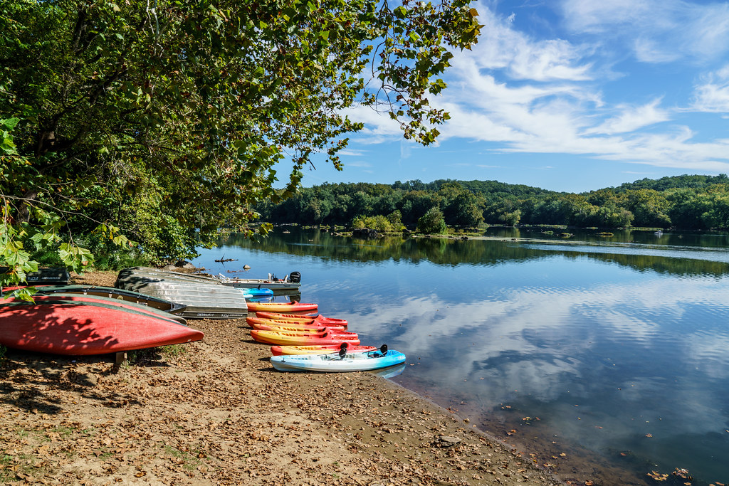 Kayaks and Boats Piled Up on a Beach on the Potomac at Riverbend Park