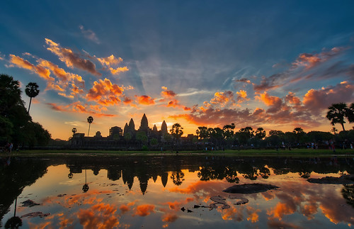 cambodia angkor wat temple hindu siem reap vishnu stone architecture sunrise sun lake reflection monument