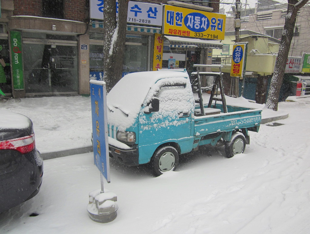 Seoul Korea winter 2012 side-street with vintage Daewoo Labo (?) truck - 