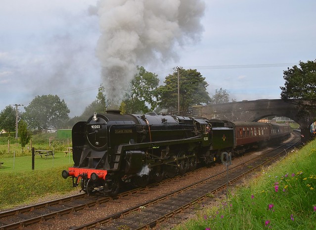 The late David Shepherds 9F Locomotive, No.92203 makes a spirited departure from Weybourne, with the 15.58 service to Holt. North Norfolk Railway Autumn Steam Gala. 03 09 2017]